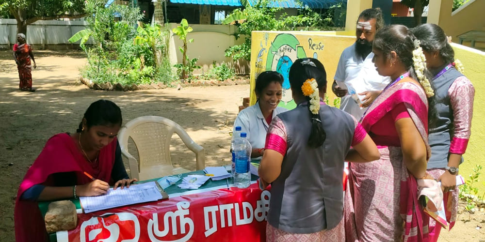 Volunteers at a cancer awareness event
