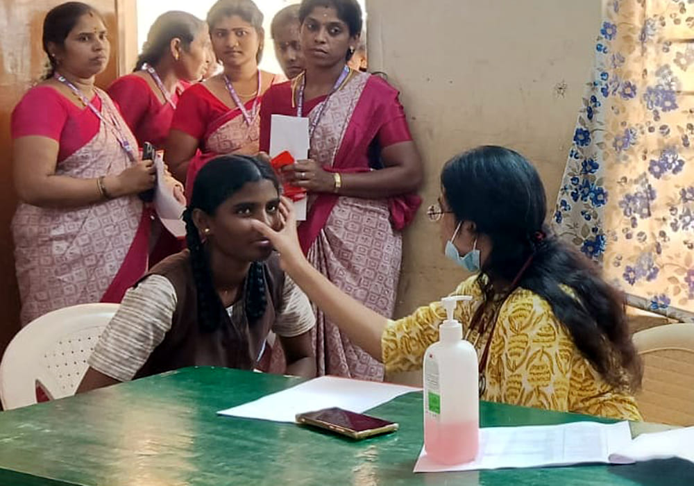Group of people participating in a health camp for early detection